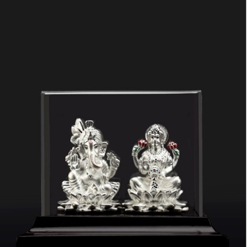 silver ganpati and laxmi  murti  by 